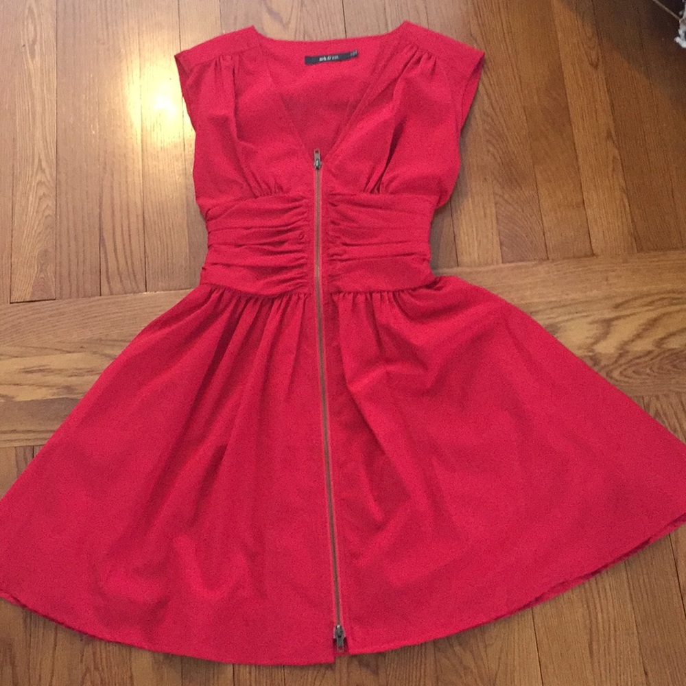 Vibrant red dress with low cut v neck front